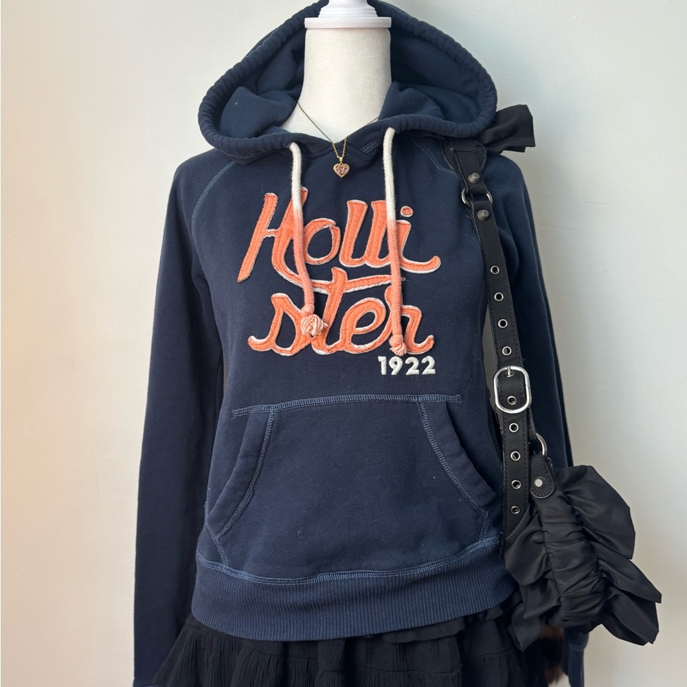 Vintage 1922 Hollister Dark Blue Hoodie with Orange Faded Logo